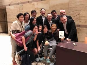 With fans in Singapore